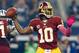 ARLINGTON, TX - OCTOBER 13: Robert Griffin III #10 of the Washington Redskins looks for an open receiver against the Dallas Cowboys in the fourth quarter on October 13, 2013 in Arlington, Texas. The Cowboys beat the Redskins 31-16. (Photo by Tom Pennington/Getty Images)