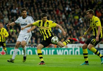Hi-res-155703941-robert-lewandowski-of-borussia-dortmund-fires-on-goal_crop_north
