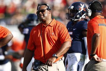 Hi-res-179977883-virginia-cavaliers-head-coach-mike-london-looks-on_crop_north