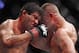Oct 19, 2013; Houston, TX, USA; Gilbert Melendez (red gloves) fights against Diego Sanchez (blue gloves) in their lightweight bout during UFC 166 at Toyota Center. Mandatory Credit: Andrew Richardson-USA TODAY Sports
