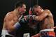 BROOMFIELD, CO - OCTOBER 19: Ruslan Provodnikov (L) of Russia delivers a punch to Mike Alvarado (R) as Provodnikov won their bout with a TKO in the 10th round to claim the WBO Junior Welterweight Title at the 1stBank Center on October 19, 2013 in Broomfield, Colorado. (Photo by Doug Pensinger/Getty Images)