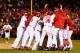 ST LOUIS, MO - OCTOBER 18: The St. Louis Cardinals celebrate after defeating the Los Angeles Dodgers 9-0 in Game Six of the National League Championship Series at Busch Stadium on October 18, 2013 in St Louis, Missouri. (Photo by Elsa/Getty Images)