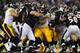 BALTIMORE, MD - DECEMBER 02: Center Maurkice Pouncey #53 of the Pittsburgh Steelers holds off Baltimore Ravens defensive linemen in the second quarter at M&T Bank Stadium on December 2, 2012 in Baltimore, Maryland. The Pittsburgh Steelers won, 23-20. (Photo by Patrick Smith/Getty Images)