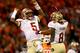CLEMSON, SC - OCTOBER 19: Jameis Winston #5 of the Florida State Seminoles celebrates after throwing a touchdown with teammate Devonta Freeman #8 of the Florida State Seminoles during their game at Memorial Stadium on October 19, 2013 in Clemson, South Carolina. (Photo by Streeter Lecka/Getty Images)