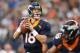 Oct 6, 2013; Arlington, TX, USA; Denver Broncos quarterback Peyton Manning (18) throws in the pocket against the Dallas Cowboys at AT&T Stadium. Mandatory Credit: Matthew Emmons-USA TODAY Sports