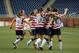 DETROIT, MI - DECEMBER 08: Carli Lloyd #10 of Team USA scores a first half goal and is congratulated by her teammates during the game against China at Ford Field on December 8, 2012 in Detroit, Michigan. USA defeated China 2-0. (Photo by Leon Halip/Getty Images)