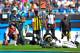 CHARLOTTE, NC - OCTOBER 20: Janoris Jenkins #21 of the St. Louis Rams tackles Steve Smith #89 of the Carolina Panthers at the 1-yard line during play at Bank of America Stadium on October 20, 2013 in Charlotte, North Carolina. The Panthers won 30-15. (Photo by Grant Halverson/Getty Images)