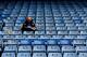 LONDON, ENGLAND - OCTOBER 19: A fan reads the paper prior to the Barclays Premier League match between Chelsea and Cardiff City at Stamford Bridge on October 19, 2013 in London, England. (Photo by Scott Heavey/Getty Images)