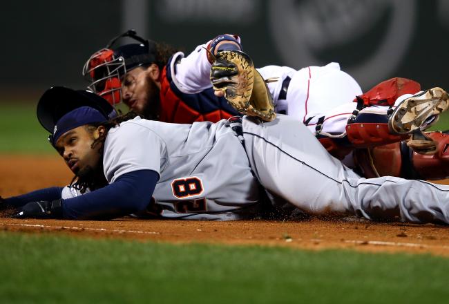 Hi-res-185377052-prince-fielder-of-the-detroit-tigers-gets-tagged-out-in_crop_north