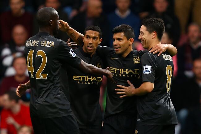 Hi-res-185355028-sergio-aguero-of-manchester-city-celebrates-his-opening_crop_north