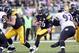 Oct 20, 2013; Pittsburgh, PA, USA; Pittsburgh Steelers running back Le'Veon Bell (26) rushes the ball against the Baltimore Ravens during the third quarter at Heinz Field. The Steelers won 19-16. Mandatory Credit: Charles LeClaire-USA TODAY Sports