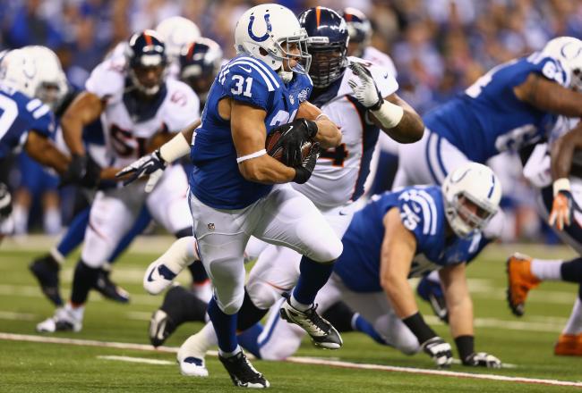 Hi-res-185448443-donald-brown-of-the-indianapolis-colts-runs-the-ball_crop_north