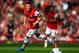 LONDON, ENGLAND - OCTOBER 19: Mesut Oezil of Arsenal in action during the Barclays Premier League match between Arsenal and Norwich City at the Emirates Stadium on October 19, 2013 in London, England. (Photo by Paul Gilham/Getty Images)