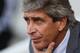 LONDON, ENGLAND - OCTOBER 19: Manuel Pellegrini the Manchester City manager looks on prior to during the Barclays Premier League match between West Ham United and Manchester City at Boleyn Ground on October 19, 2013 in London, England. (Photo by Warren Little/Getty Images)