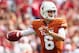 DALLAS, TX - OCTOBER 12: Case McCoy #6 of the Texas Longhorns looks for an open receiver in the first quarter against the Oklahoma Sooners at the Cotton Bowl on October 12, 2013 in Dallas, Texas. (Photo by Tom Pennington/Getty Images)