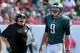 TAMPA, FL - OCTOBER 13: Quarterback Nick Foles #9 of the Philadelphia Eagles talks with coach Chip Kelly as time runs down in the 4th quarter against the Tampa Bay Buccaneers October 13, 2013 at Raymond James Stadium in Tampa, Florida. The Eagles won 31 - 20. (Photo by Al Messerschmidt/Getty Images)