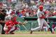 FORT MYERS, FL - FEBRUARY 26: Justin Christian #60 of the St. Louis Cardinals doubles to left field in the six inning during the game against the Boston Red Sox at JetBlue Park on February 26, 2013 in Fort Myers, Florida. (Photo by Leon Halip/Getty Images)