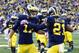 Oct 19, 2013; Ann Arbor, MI, USA; Michigan Wolverines wide receiver Jeremy Gallon (21) receives congratulations from wide receiver Jeremy Jackson (17) after scoring a touchdown in the second quarter against the Indiana Hoosiers at Michigan Stadium. Mandatory Credit: Rick Osentoski-USA TODAY Sports
