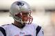 EAST RUTHERFORD, NJ - OCTOBER 20: Tom Brady #12 of the New England Patriots looks on during the fourth quarter against the New York Jets at MetLife Stadium on October 20, 2013 in East Rutherford, New Jersey. The Jets defeat the Patriots 30-27 in overtime. (Photo by Maddie Meyer/Getty Images)