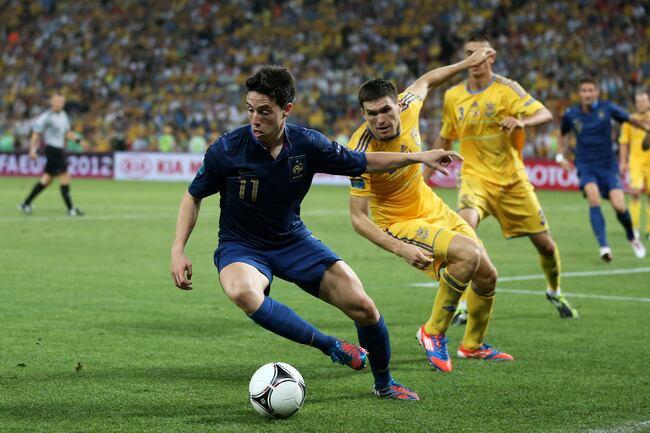 Hi-res-146398077-samir-nasri-of-france-in-action-against-yevhen-selin-of_crop_north