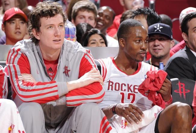 Hi-res-183643332-dwight-howard-and-omer-asik-of-the-houston-rockets_crop_north