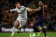 BARCELONA, SPAIN - FEBRUARY 26: Daniel Alves (R) of Barcelona looses the ball to Sergio Ramos of Real Madrid during the Copa del Rey semi final second leg match between FC Barcelona and Real Madrid CF at the Camp Nou on February 26, 2013 in Barcelona, Spain. (Photo by Jasper Juinen/Getty Images)