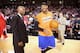 BALTIMORE, MD - OCTOBER 17: Carmelo Anthony #7 of the New York Knicks chats with fellow Baltimore native Sam Cassell, assistant coach of the Washington Wizards during the pre-season game at the Baltimore Arena on October 17, 2013 in Baltimore, MD. NOTE TO USER: User expressly acknowledges and agrees that, by downloading and or using this photograph, User is consenting to the terms and conditions of the Getty Images License Agreement. Mandatory Copyright Notice: Copyright 2013 NBAE (Photo by Ned Dishman/NBAE via Getty Images)
