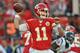KANSAS CITY, MO - OCTOBER 20: Quarterback Alex Smith #11 of the Kansas City Chiefs throws a pass against the Houston Texans during the first half on October 20, 2013 at Arrowhead Stadium in Kansas City, Missouri. (Photo by Peter Aiken/Getty Images)