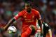 LIVERPOOL, ENGLAND - AUGUST 27: Andre Wisdom of Liverpool in action during the Capital One Cup Second Round between Liverpool and Notts County at Anfield on August 27, 2013 in Liverpool, England. (Photo by Laurence Griffiths/Getty Images)