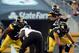 Oct 20, 2013; Pittsburgh, PA, USA; Pittsburgh Steelers running back Le'Veon Bell (26) takes a direct snap against the Baltimore Ravens during the second half at Heinz Field. The Steelers won the game, 19-16. Mandatory Credit: Jason Bridge-USA TODAY Sports