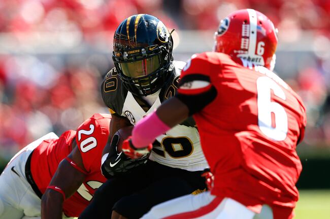 Hi-res-184230614-henry-josey-of-the-missouri-tigers-rushes-against_crop_north
