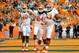 Oct 5, 2013; Syracuse, NY, USA; Clemson Tigers running back Zac Brooks (24) celebrates his second quarter touchdown with quarterback Tajh Boyd (10) and offensive tackle Brandon Thomas (63) during the second quarter against the Syracuse Orange at the Carrier Dome. Clemson defeated Syracuse 49-14. Mandatory Credit: Rich Barnes-USA TODAY Sports
