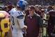 Sep 21, 2013; Minneapolis, MN, USA; San Jose State Spartans quarterback David Fales (10) and Minnesota Golden Gophers head coach Jerry Kill talk after the game at TCF Bank Stadium. The Gophers won 43-24. Mandatory Credit: Jesse Johnson-USA TODAY Sports