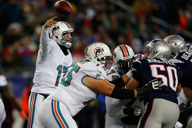 Hi-res-158821905-ryan-tannehill-of-the-miami-dolphins-throws-against-the_crop_north