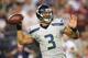 GLENDALE, AZ - OCTOBER 17: Quarterback Russell Wilson #3 of the Seattle Seahawks throws a pass during the NFL game against the Arizona Cardinals at the University of Phoenix Stadium on October 17, 2013 in Glendale, Arizona. The Seahawks defeated the Cardinals 34-22. (Photo by Christian Petersen/Getty Images)