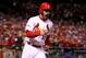 ST LOUIS, MO - OCTOBER 18: Matt Carpenter #13 of the St. Louis Cardinals reacts after scoring a run in the third inning against the Los Angeles Dodgers in Game Six of the National League Championship Series at Busch Stadium on October 18, 2013 in St Louis, Missouri. (Photo by Dilip Vishwanat/Getty Images)