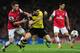 LONDON, ENGLAND - OCTOBER 22: Laurent Koscielny of Arsenal and Robert Lewandowski of Borussia Dortmund battle for the ball during the UEFA Champions League Group F match between Arsenal and Borussia Dortmund at Emirates Stadium on October 22, 2013 in London, England. (Photo by Shaun Botterill/Getty Images)