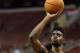 Oct 14, 2013; Philadelphia, PA, USA; Philadelphia 76ers center Nerlens Noel (4) practices one handed shooting during warmups prior to the game against the Brooklyn Nets at Wells Fargo Center. Mandatory Credit: Howard Smith-USA TODAY Sports