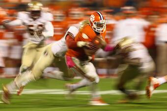Hi-res-185381553-tajh-boyd-of-the-clemson-tigers-runs-with-the-ball_crop_north