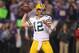 Dec 30, 2012; Minneapolis, MN, USA; Green Back Packers quarterback Aaron Rodgers (12) throws during the fourth quarter against the Minnesota Vikings at the Metrodome. The Vikings defeated the Packers 37-34. Mandatory Credit: Brace Hemmelgarn-USA TODAY Sports