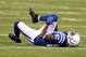 Oct 20, 2013; Indianapolis, IN, USA; Indianapolis Colts wide receiver Reggie Wayne (87) reacts after sustaining an injury against the Denver Broncos in the 2nd half during the game at Lucas Oil Stadium. Mandatory Credit: Brian Spurlock-USA TODAY Sports