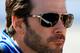 TALLADEGA, AL - OCTOBER 20: Jimmie Johnson, driver of the #48 Lowe's Chevrolet, looks on prior to the NASCAR Sprint Cup Series Camping World RV Sales 500 at Talladega Superspeedway on October 20, 2013 in Talladega, Alabama. (Photo by Jerry Markland/Getty Images)