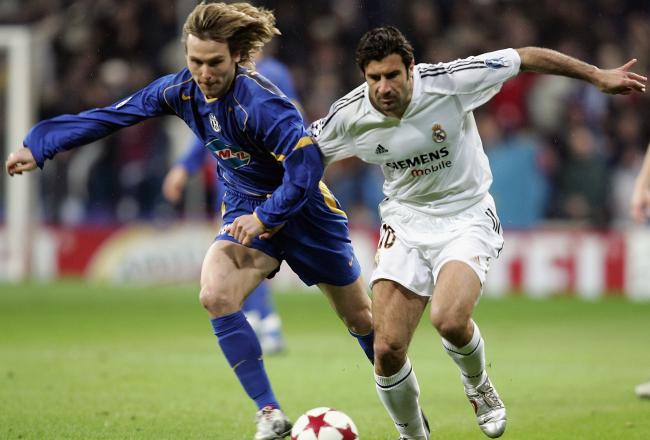Hi-res-52228573-luis-figo-of-real-madrid-is-challenged-by-pavel-nedved_crop_north