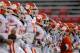 COLLEGE PARK, MD - OCTOBER 15: Head coach Dabo Swinney of the Clemson Tigers (C) walks with his players on the field during warm-ups before the start of their game against the Maryland Terrapins at Byrd Stadium on October 15, 2011 in College Park, Maryland. (Photo by Rob Carr/Getty Images)