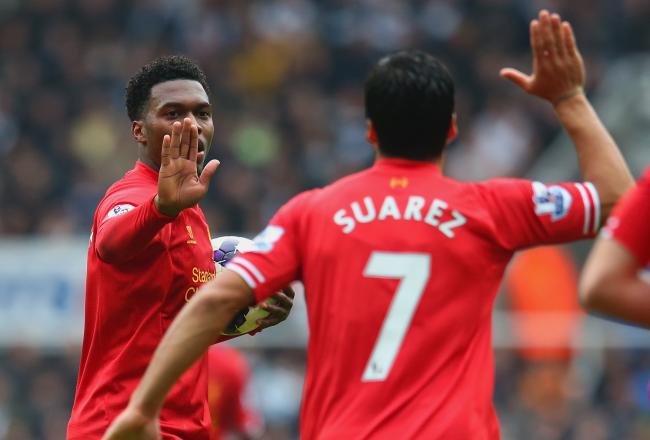 Hi-res-185346910-daniel-sturridge-of-liverpool-high-fives-luis-suarez-of_crop_north