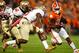 CLEMSON, SC - OCTOBER 19: Roderick McDowell #25 of the Clemson Tigers carries the ball during the game against the Florida State Seminoles at Memorial Stadium on October 19, 2013 in Clemson, South Carolina. (Photo by Tyler Smith/Getty Images)