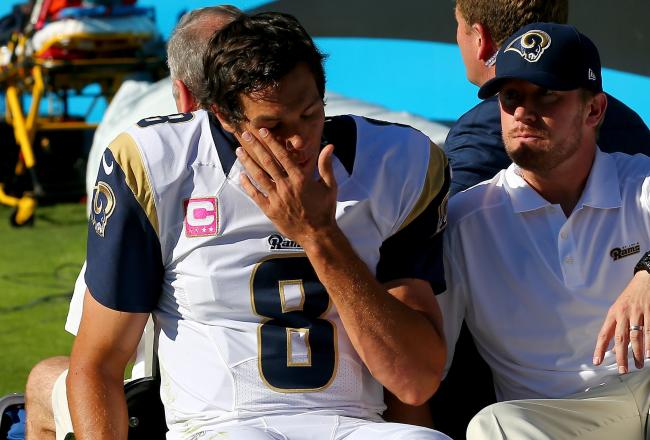 Hi-res-185429556-sam-bradford-of-the-st-louis-rams-is-carted-off-the_crop_north