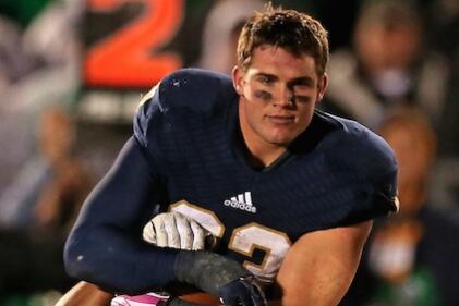 Ridiculously Photogenic Running Back Stars In Impossible Photo