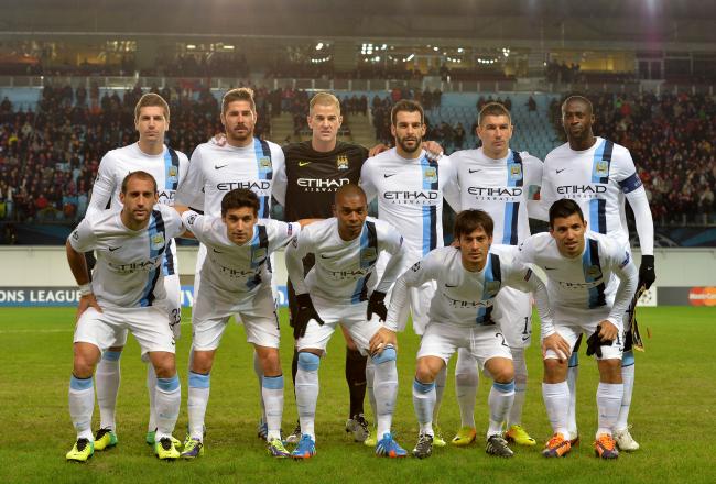 Hi-res-185642776-the-manchester-city-fc-squad-line-up-ahead-of-the-uefa_crop_north