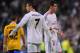 MADRID, SPAIN - OCTOBER 23: Gareth Bale (R) and Cristiano Ronaldo of Real Madrid CF look on at the end of the UEFA Champions League Group B match between Real Madrid CF and Juventus at Estadio Santiago Bernabeu on October 23, 2013 in Madrid, Spain. (Photo by Denis Doyle/Getty Images)